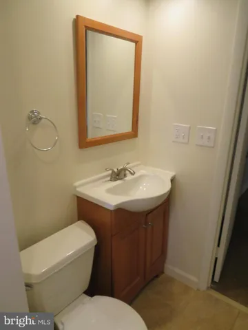 a view of a backyard with large tree