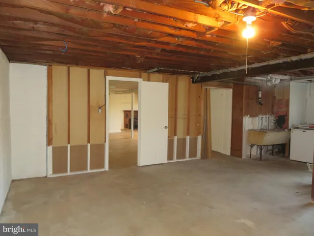 a view of deck with mountain view and wooden floor