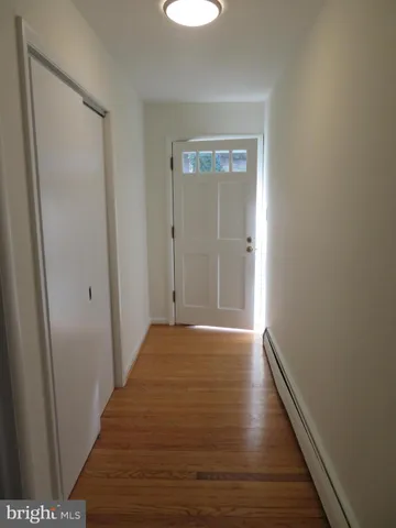 a backyard of a house with lots of trees