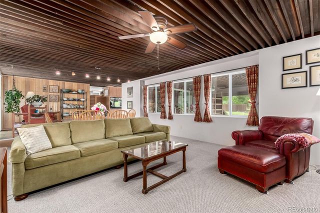 a outdoor space with lots of furniture and windows