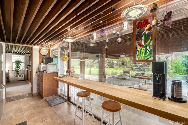 a bed room with a bed and a television