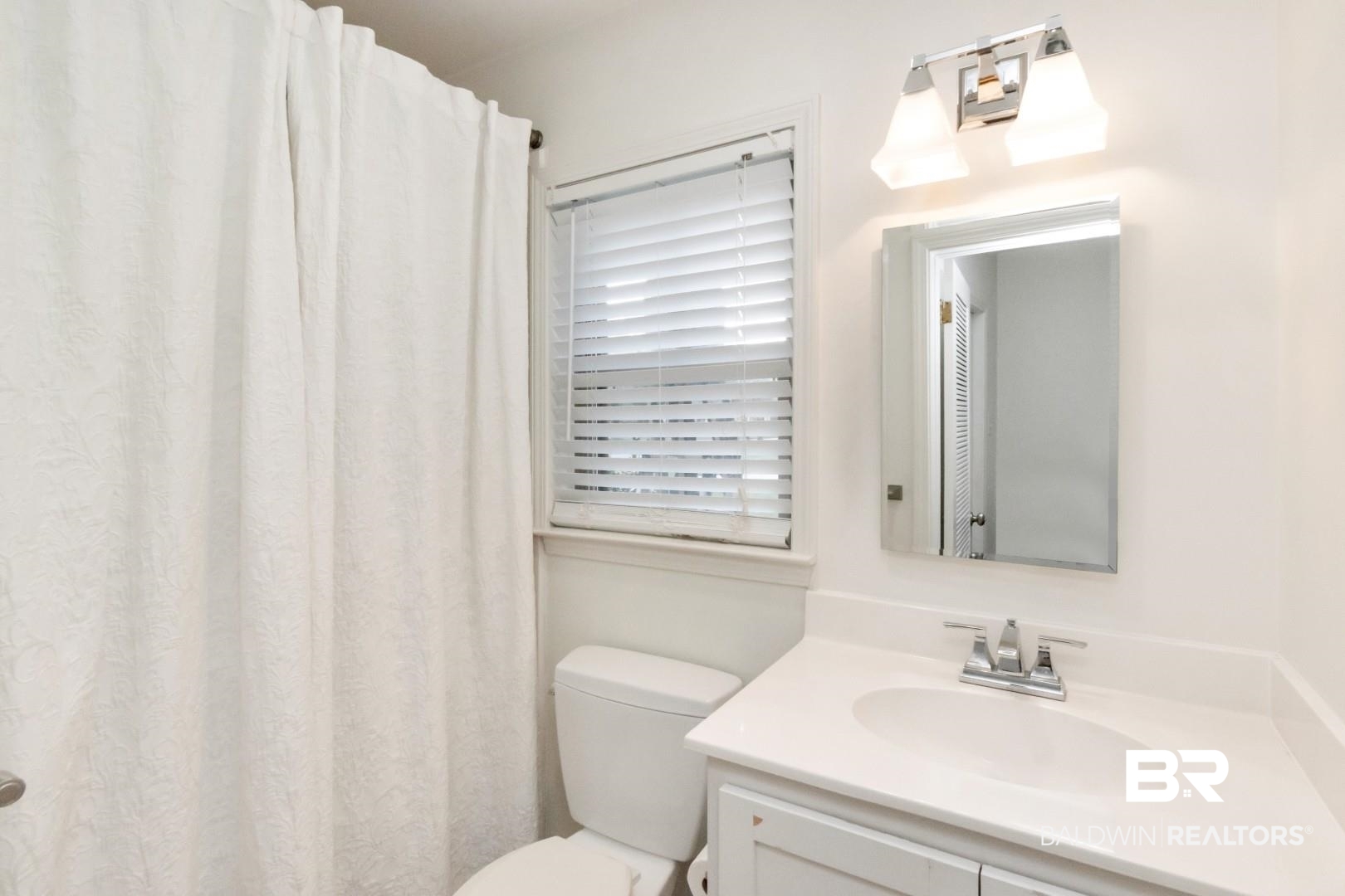 154 Fenwick Road Mobile, AL 36608 - Photo 33 of 48 Full bathroom featuring curtained shower and vanity