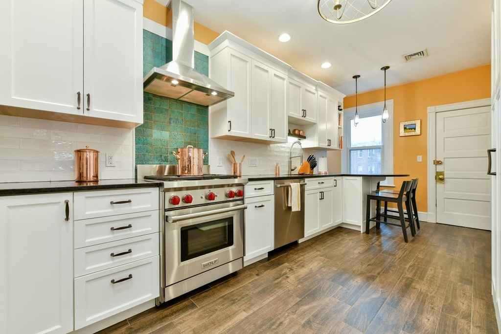 17 Strathmore Road, Unit 3 Brookline, MA 02445 - Photo 13 of 24 a kitchen with cabinets a sink and appliances