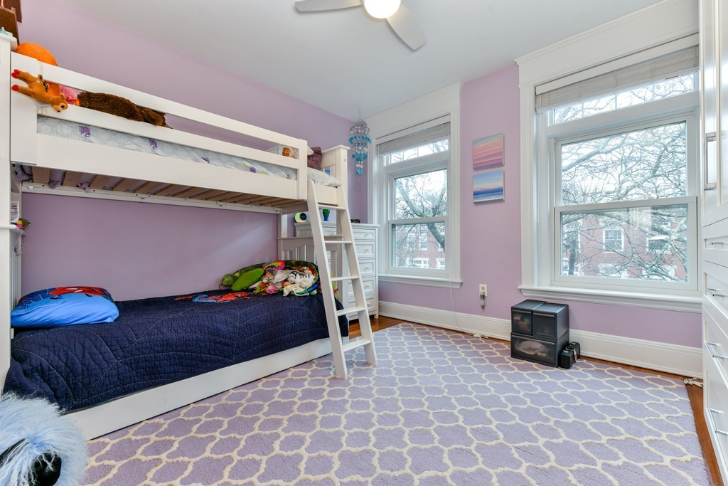 17 Strathmore Road, Unit 3 Brookline, MA 02445 - Photo 16 of 24 a bedroom with a bed and a window