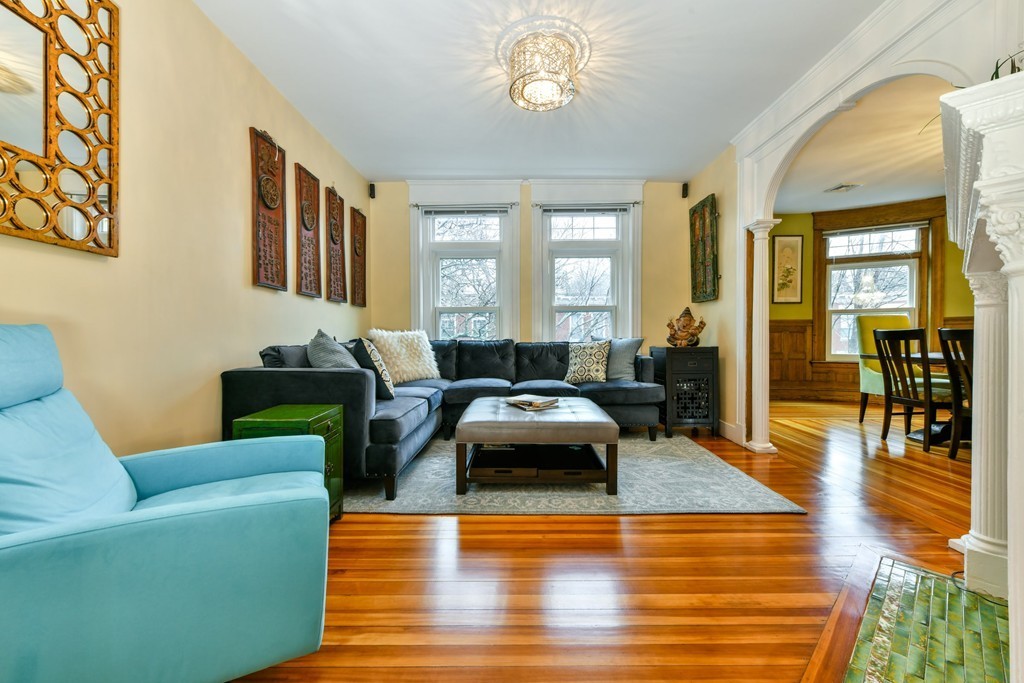 17 Strathmore Road, Unit 3 Brookline, MA 02445 - Photo 5 of 24 a living room with furniture and a wooden floor