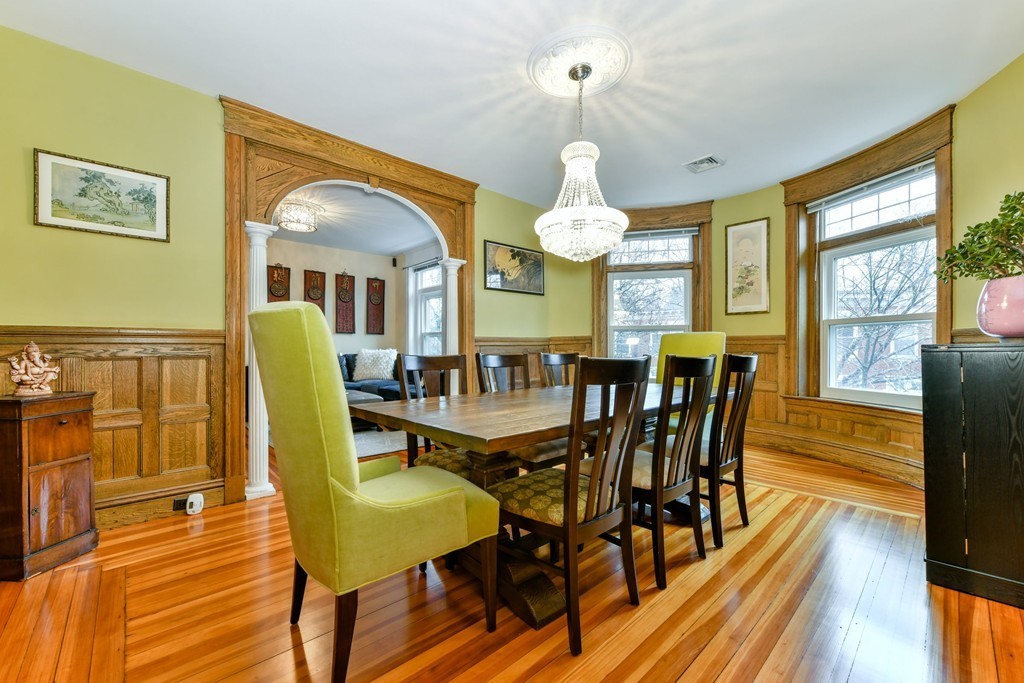 17 Strathmore Road, Unit 3 Brookline, MA 02445 - Photo 9 of 24 a view of a dining room with furniture and wooden floor