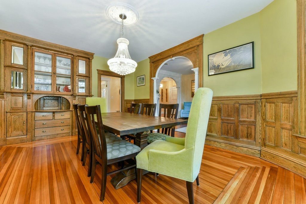 17 Strathmore Road, Unit 3 Brookline, MA 02445 - Photo 10 of 24 a view of a dining room with furniture a chandelier and wooden floor