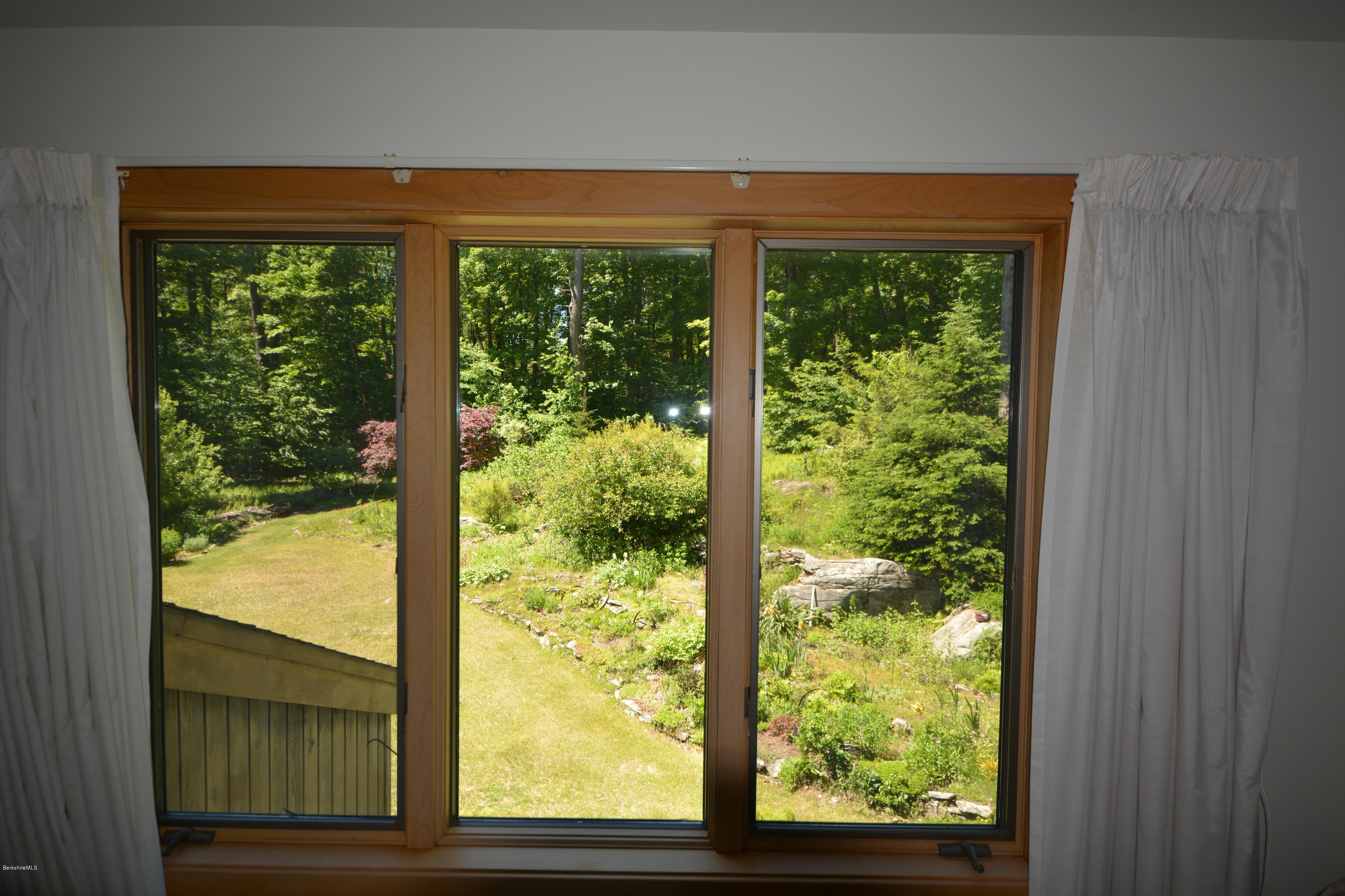 1304 West Center Road Otis, MA 01253 - Photo 18 of 28 a view of an outdoor space with a lake view
