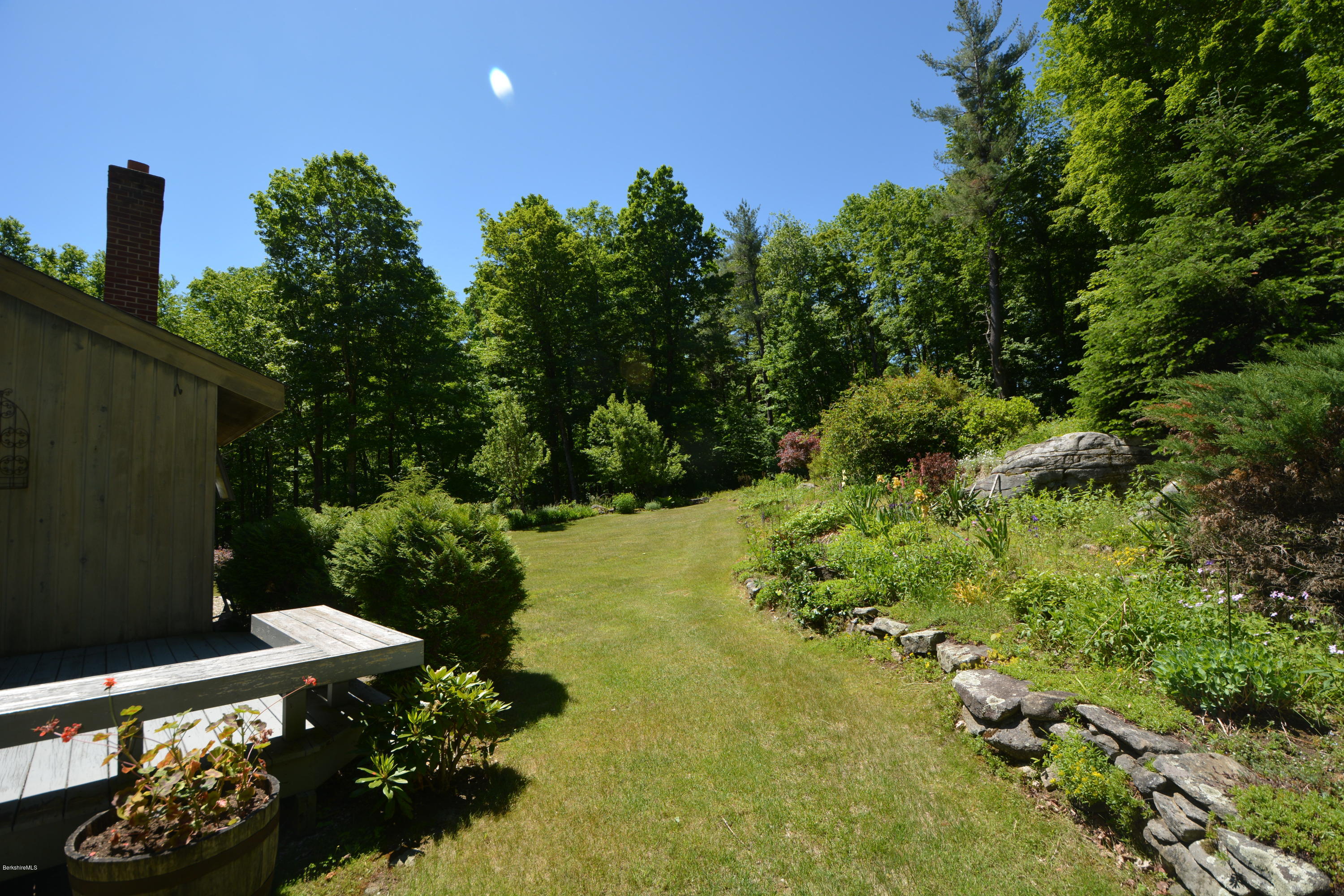 1304 West Center Road Otis, MA 01253 - Photo 21 of 28 a view of a garden with plants