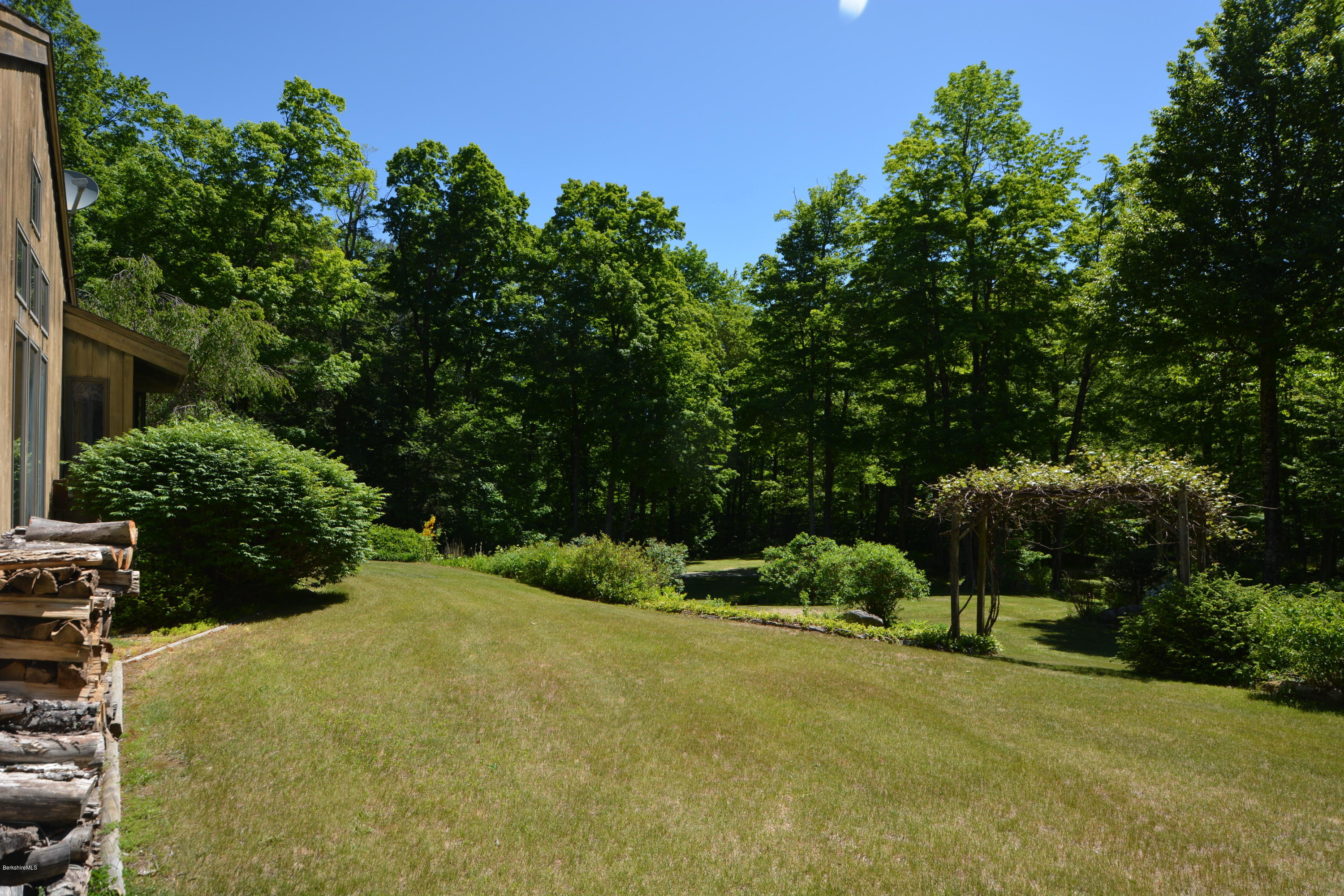 1304 West Center Road Otis, MA 01253 - Photo 22 of 28 a view of a backyard