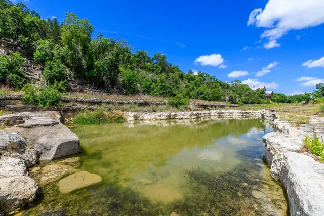 a view of a lake with outdoor space
