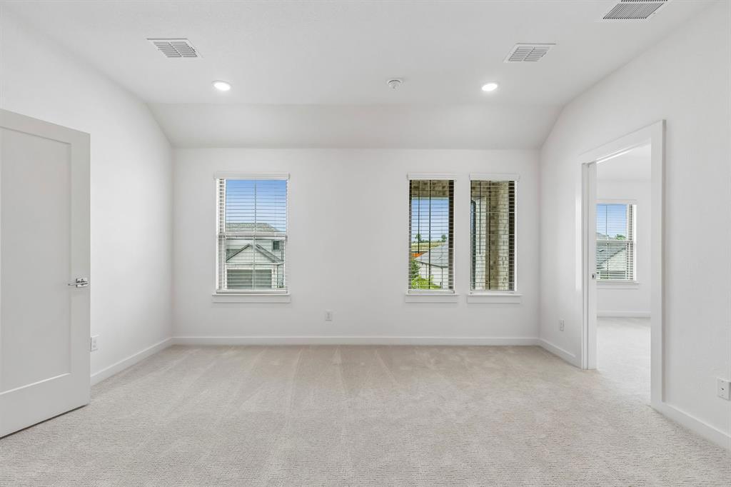 1429 Companero Street Haslet, TX 76052 - Photo 26 of 35 an empty room with windows