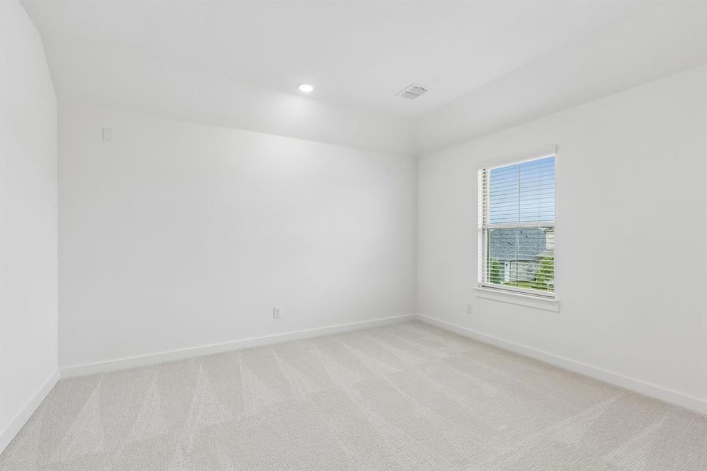 1429 Companero Street Haslet, TX 76052 - Photo 27 of 35 an empty room with a window