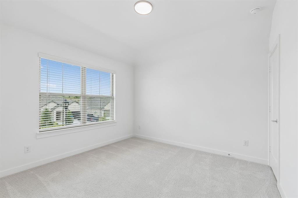1429 Companero Street Haslet, TX 76052 - Photo 30 of 35 an empty room with a window