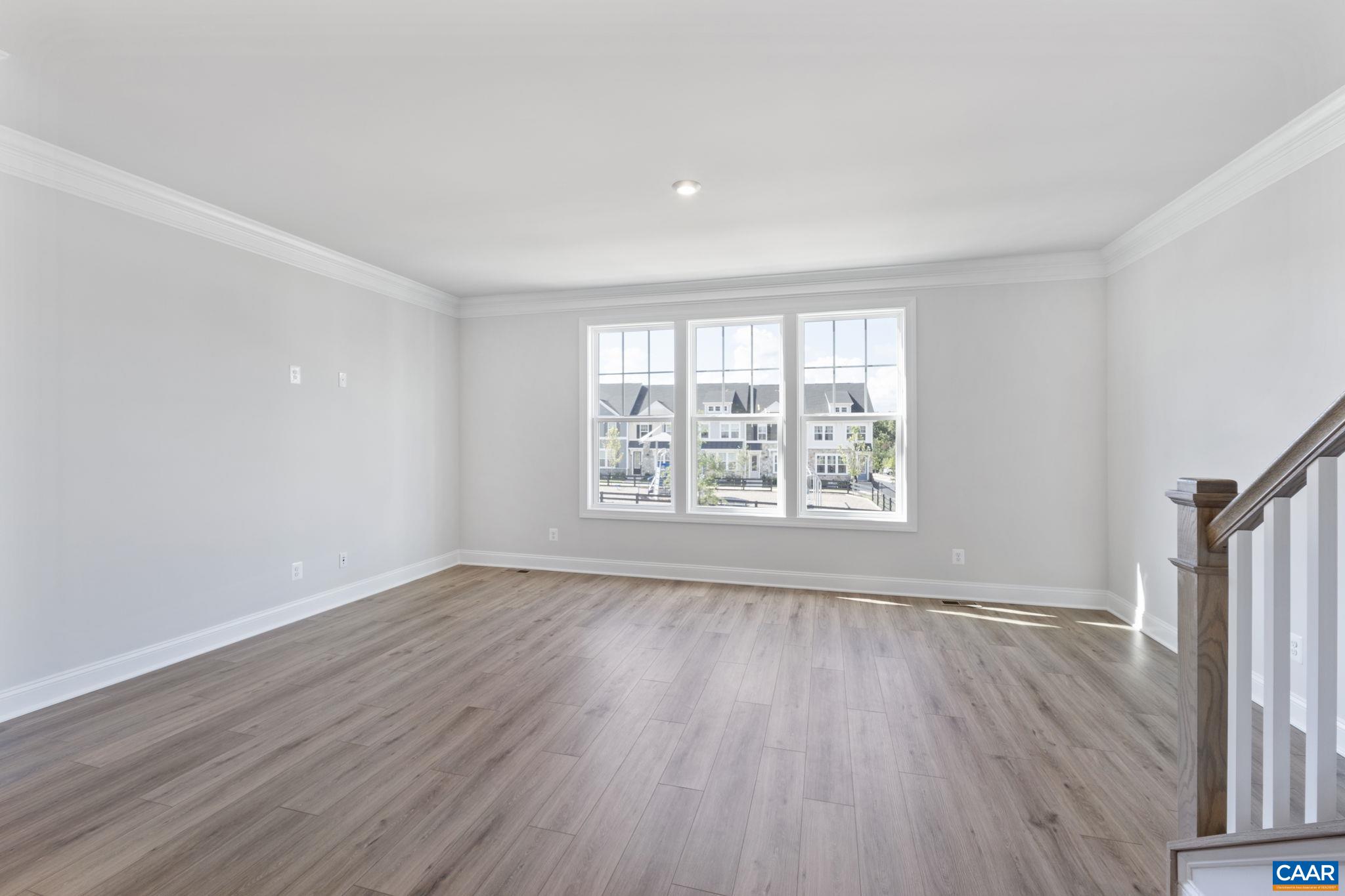 108 Park Ridge Drive Crozet, VA 22932 - Photo 26 of 54 an empty room with wooden floor and windows