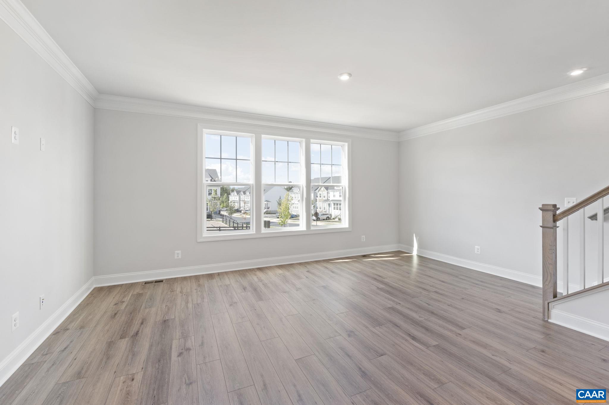 108 Park Ridge Drive Crozet, VA 22932 - Photo 27 of 54 an empty room with wooden floor and windows