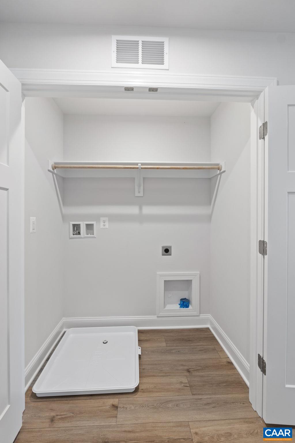 108 Park Ridge Drive Crozet, VA 22932 - Photo 36 of 54 a view of an empty room with wooden floor and cabinet