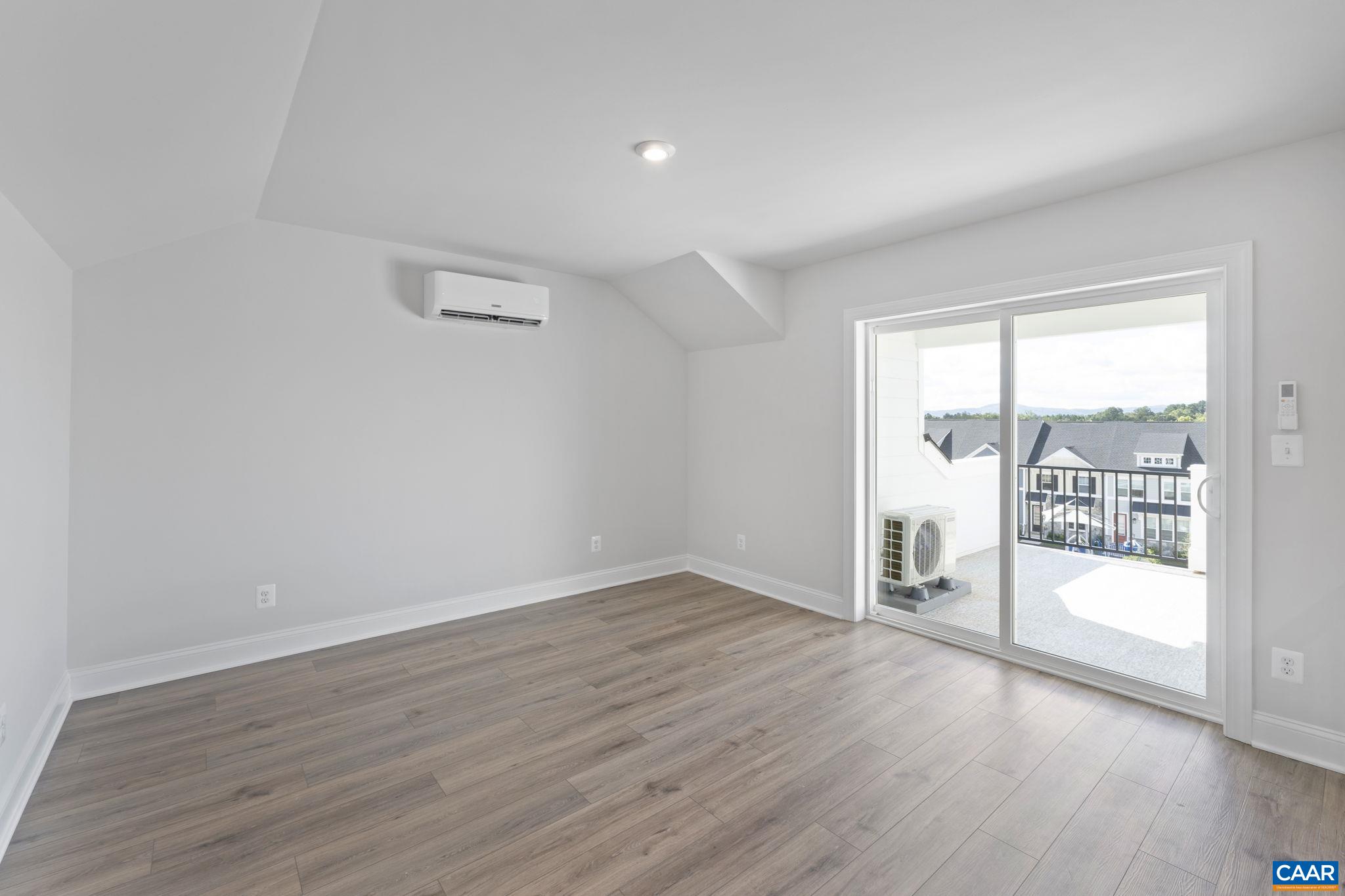 108 Park Ridge Drive Crozet, VA 22932 - Photo 43 of 54 wooden floor in an empty room with a window
