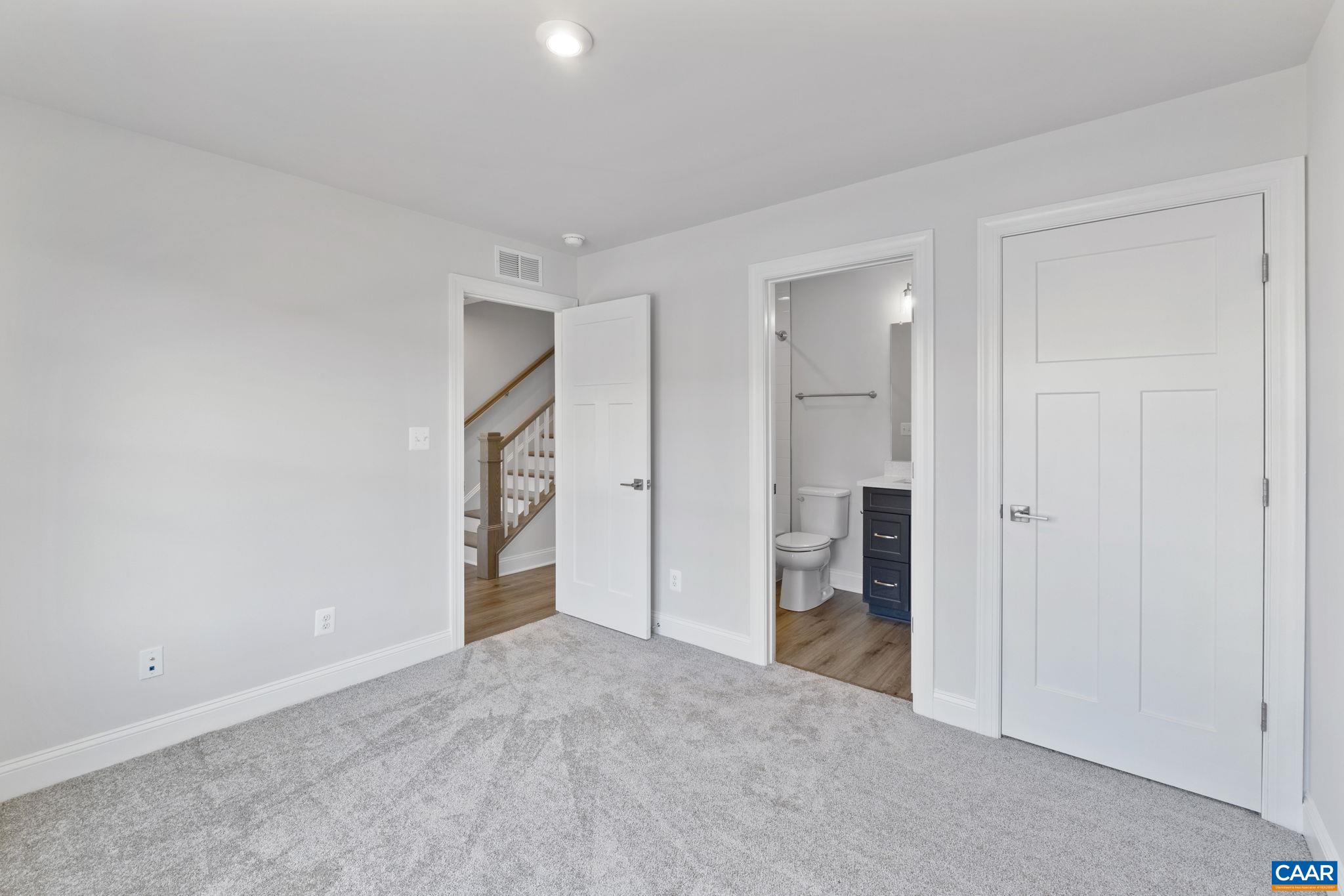 108 Park Ridge Drive Crozet, VA 22932 - Photo 10 of 54 an empty room with closet and wooden floor