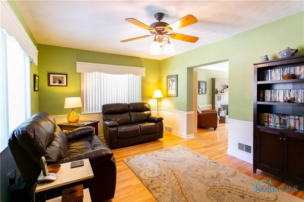 2435 Goddard Road Toledo, OH 43606 - Photo 7 of 35 FAMILY ROOM/HARDWOOD FLOORS