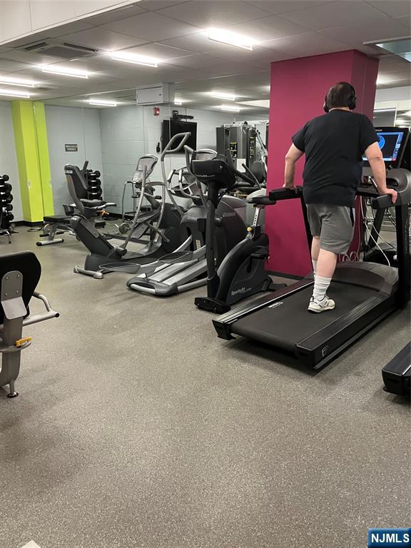 280 Prospect Avenue, Unit 11H Hackensack, NJ 07601 - Photo 18 of 20 a room with gym equipment