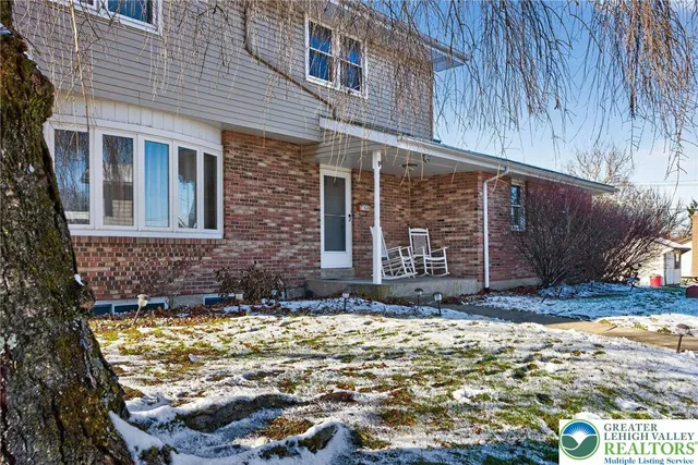 a front view of a house with street
