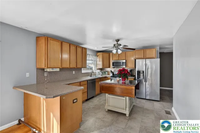 a view of a living room and dining room
