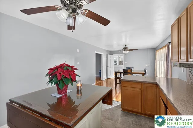 a living room with furniture and windows