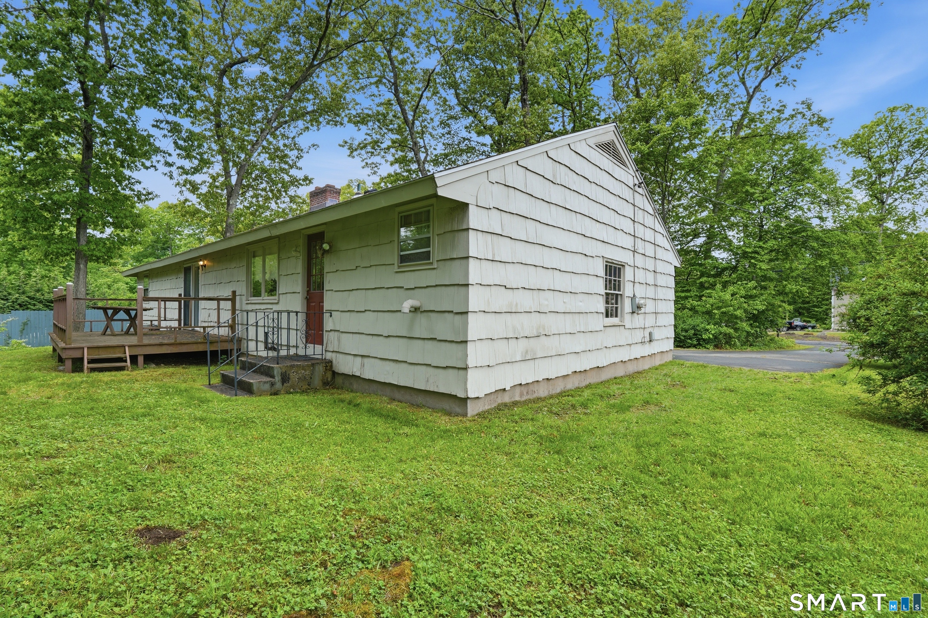 731 Still Hill Road Hamden, CT 06518 - Photo 38 of 40 a view of a house with a backyard