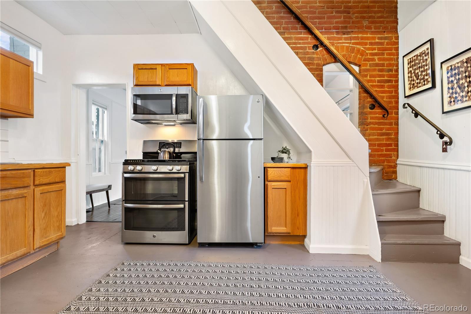 4743 Tejon Street Denver, CO 80211 - Photo 20 of 30 a view of kitchen with stainless steel appliances and cabinets