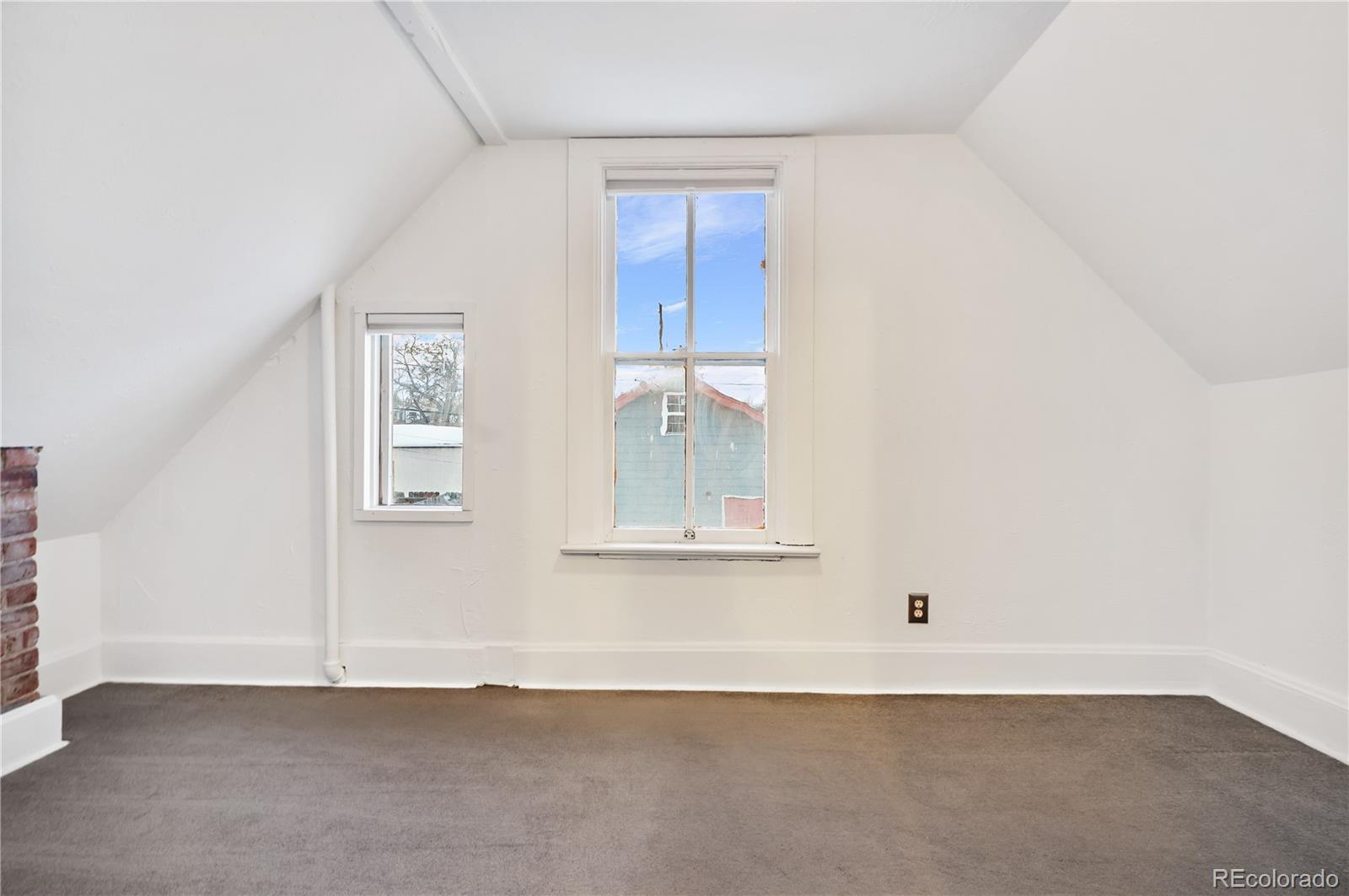 4743 Tejon Street Denver, CO 80211 - Photo 21 of 30 an empty room with window