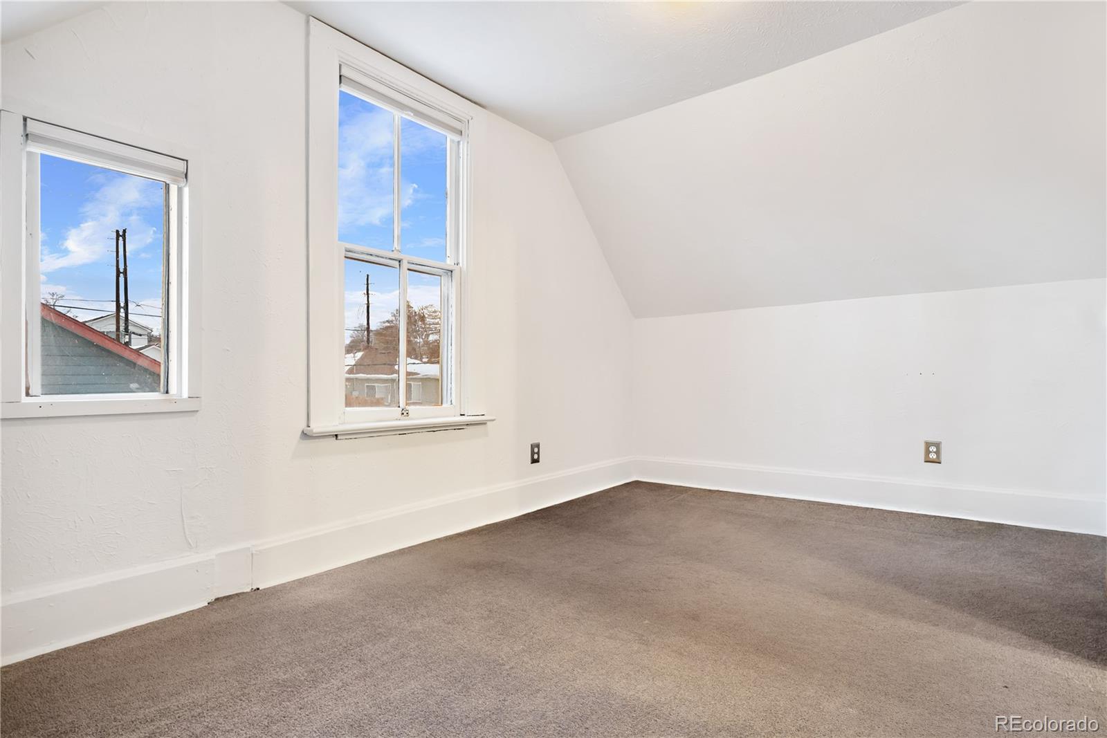 4743 Tejon Street Denver, CO 80211 - Photo 23 of 30 a view of an empty room with a window