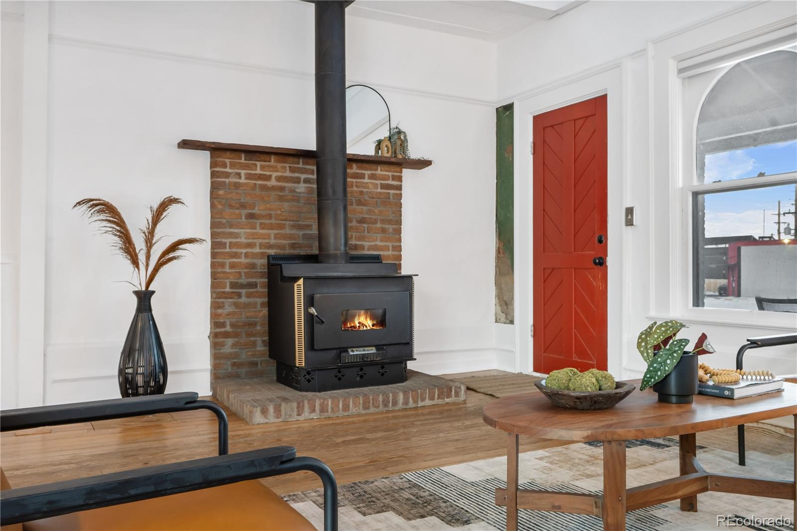 4743 Tejon Street Denver, CO 80211 - Photo 5 of 30 a living room with furniture and a fireplace