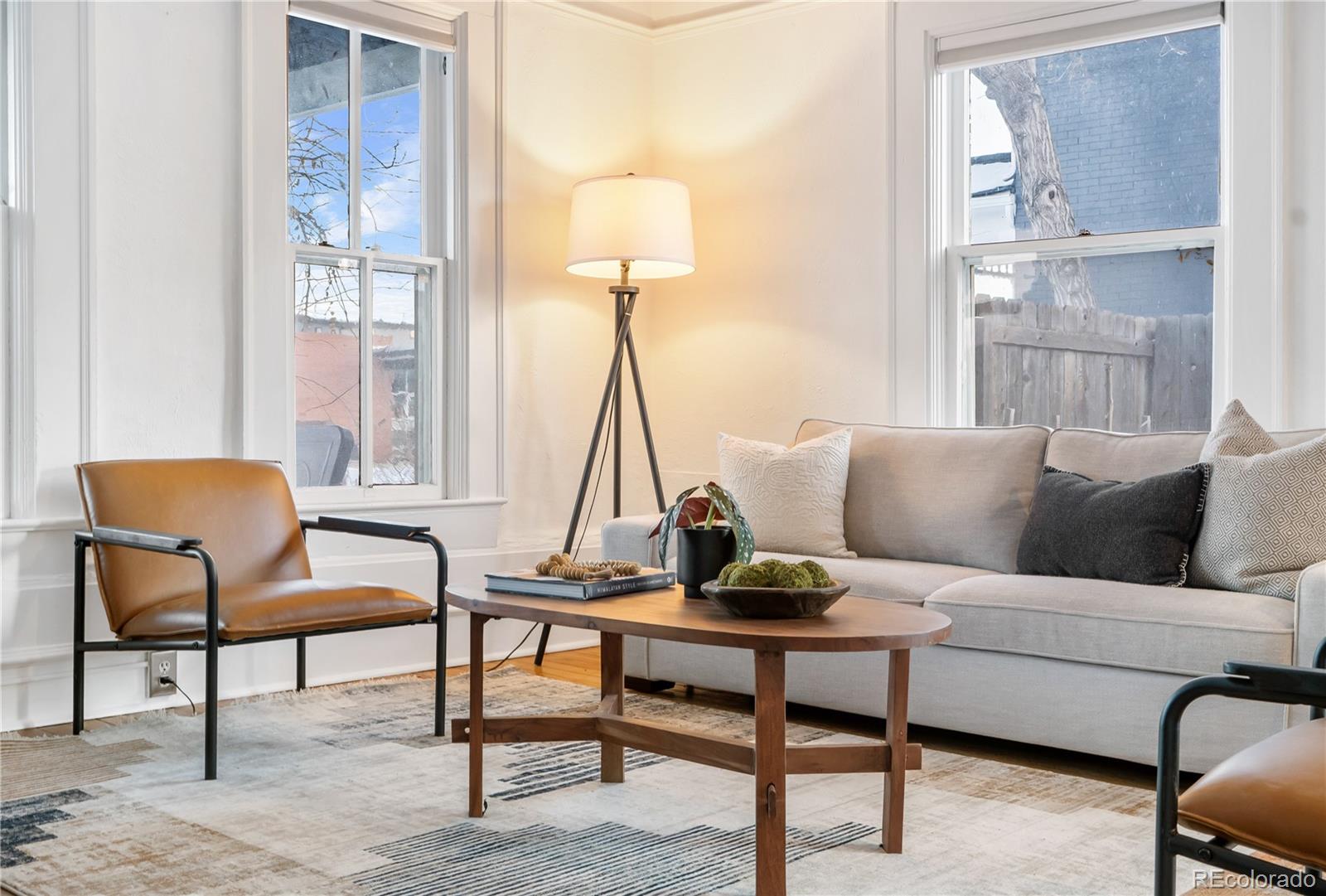4743 Tejon Street Denver, CO 80211 - Photo 8 of 30 a living room with furniture and a window