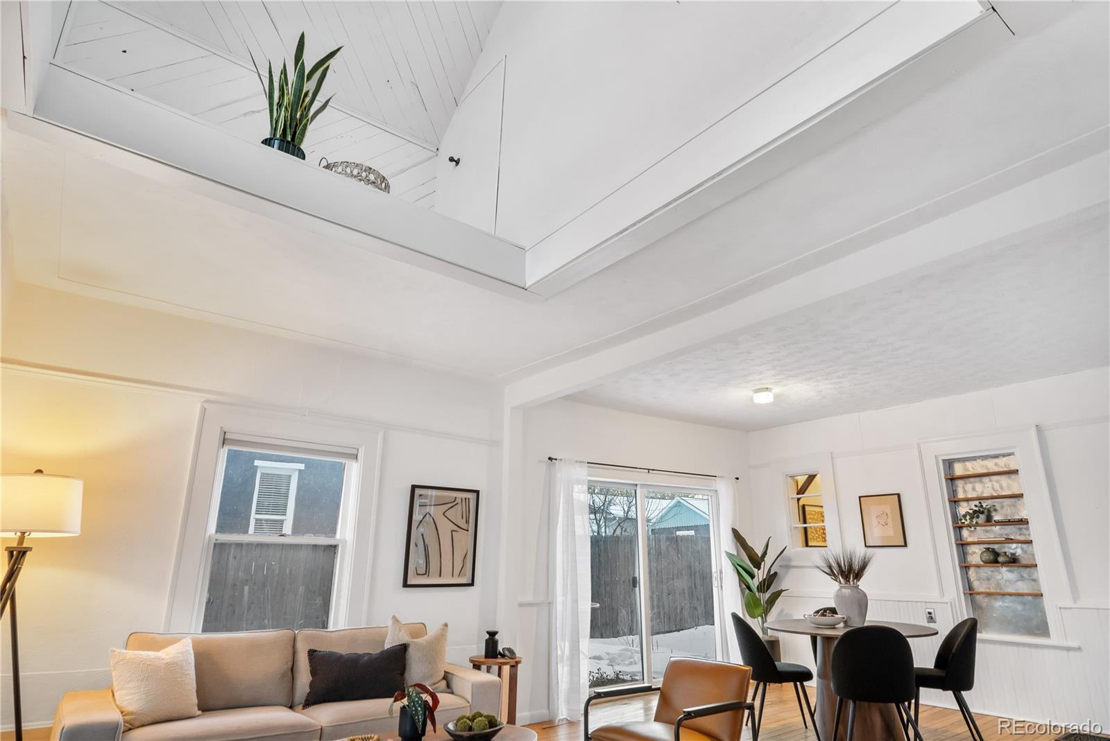 4743 Tejon Street Denver, CO 80211 - Photo 10 of 30 a living room with furniture potted plant and a window
