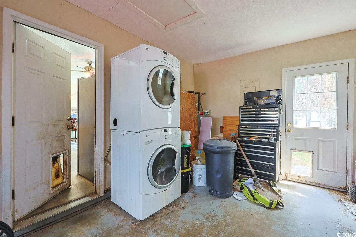 210 Rail Street Longs, SC 29568 - Photo 27 of 32 Laundry area featuring stacked washer / dryer