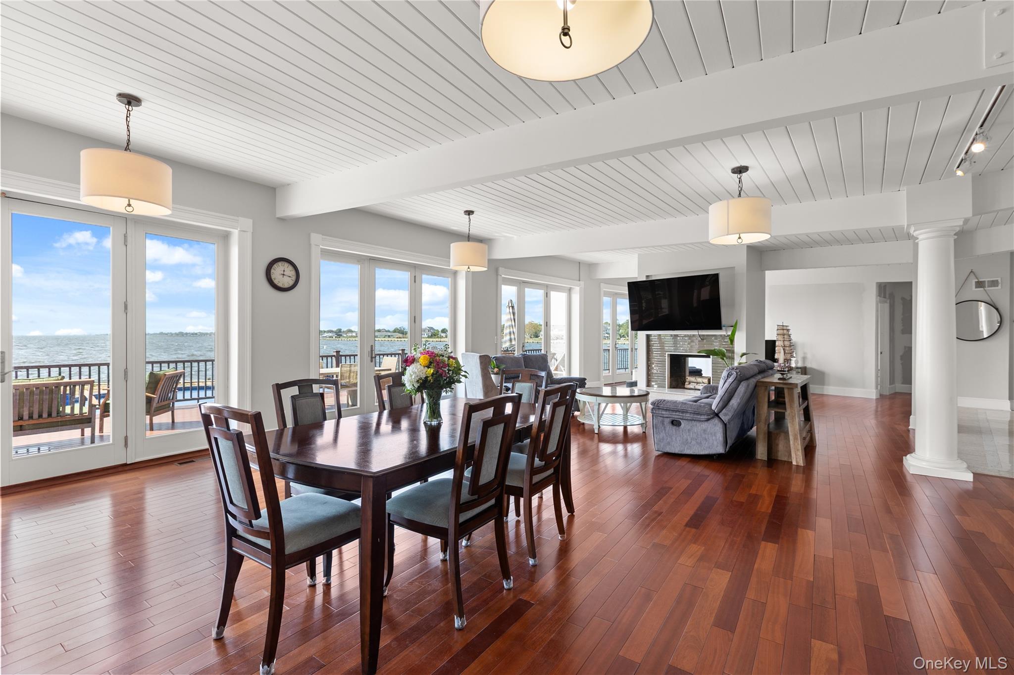 10 Great Cove Lane Islip, NY 11751 - Photo 14 of 31 a view of a dining room with furniture window and wooden floor