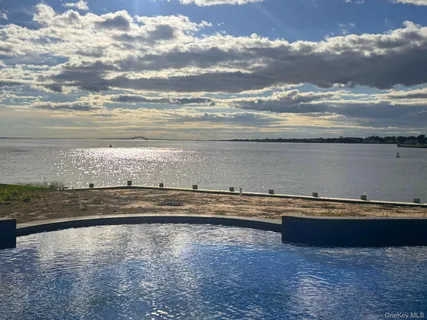 a view of a swimming pool and outdoor space