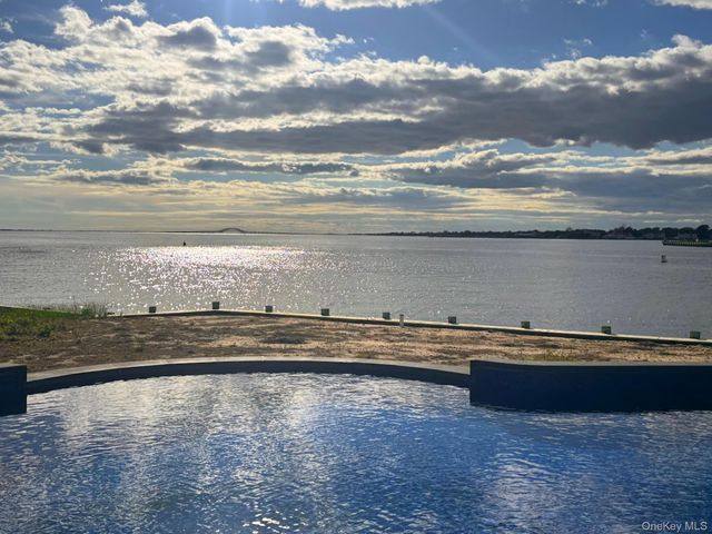 a view of a swimming pool and outdoor space