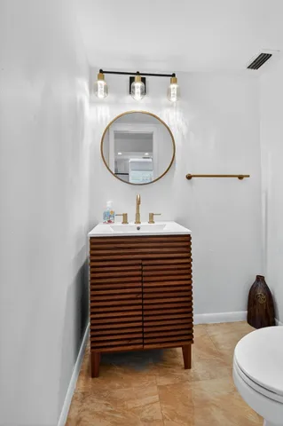 a view of a hallway with washer and dryer