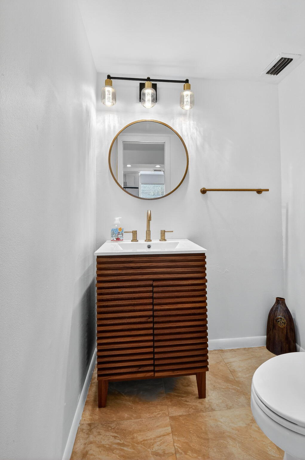 5340 Northwest 2nd Avenue, Unit 220 Boca Raton, FL 33487 - Photo 18 of 46 a view of a hallway with washer and dryer