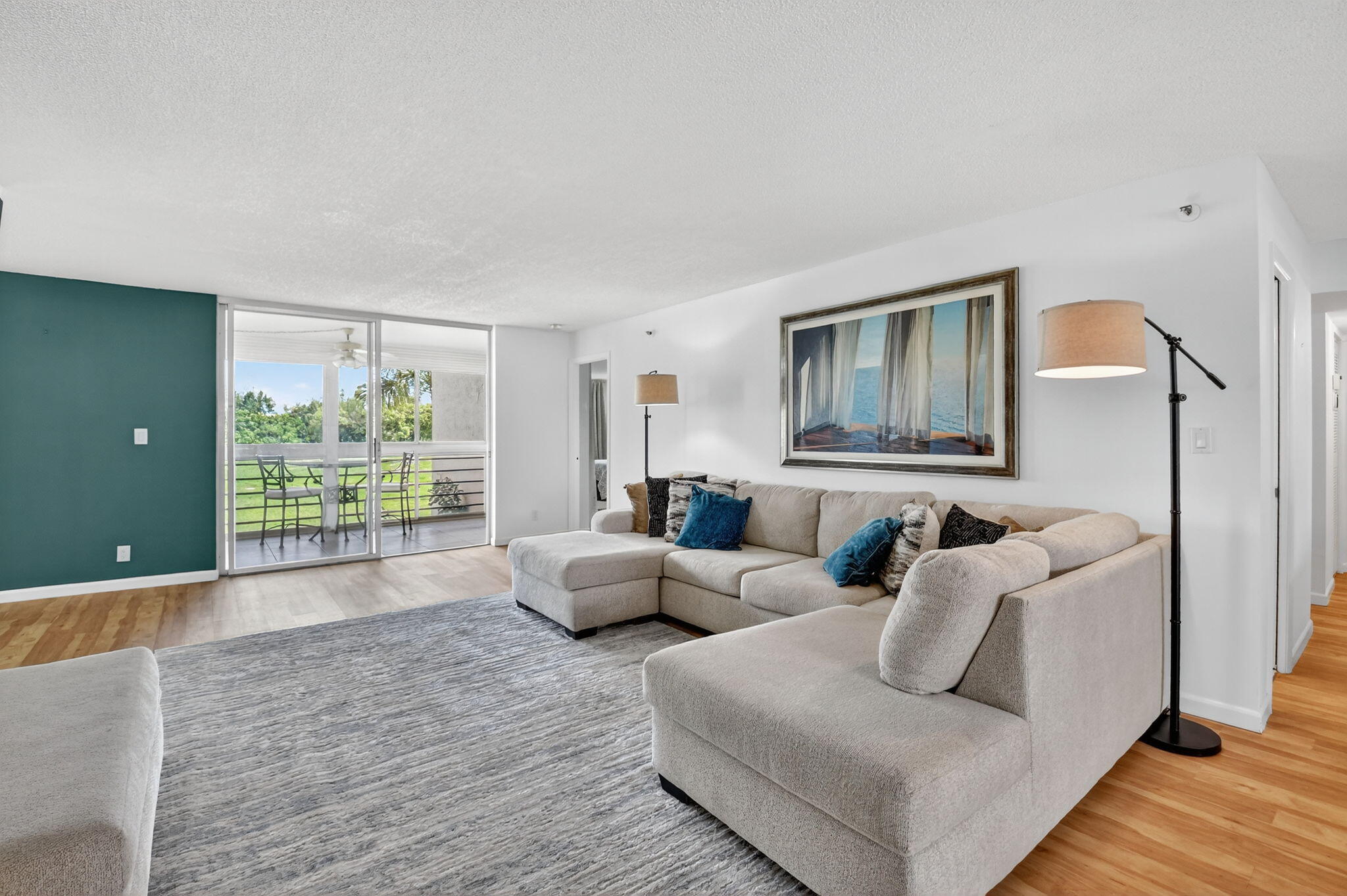 5340 Northwest 2nd Avenue, Unit 220 Boca Raton, FL 33487 - Photo 3 of 46 a living room with furniture and a large window