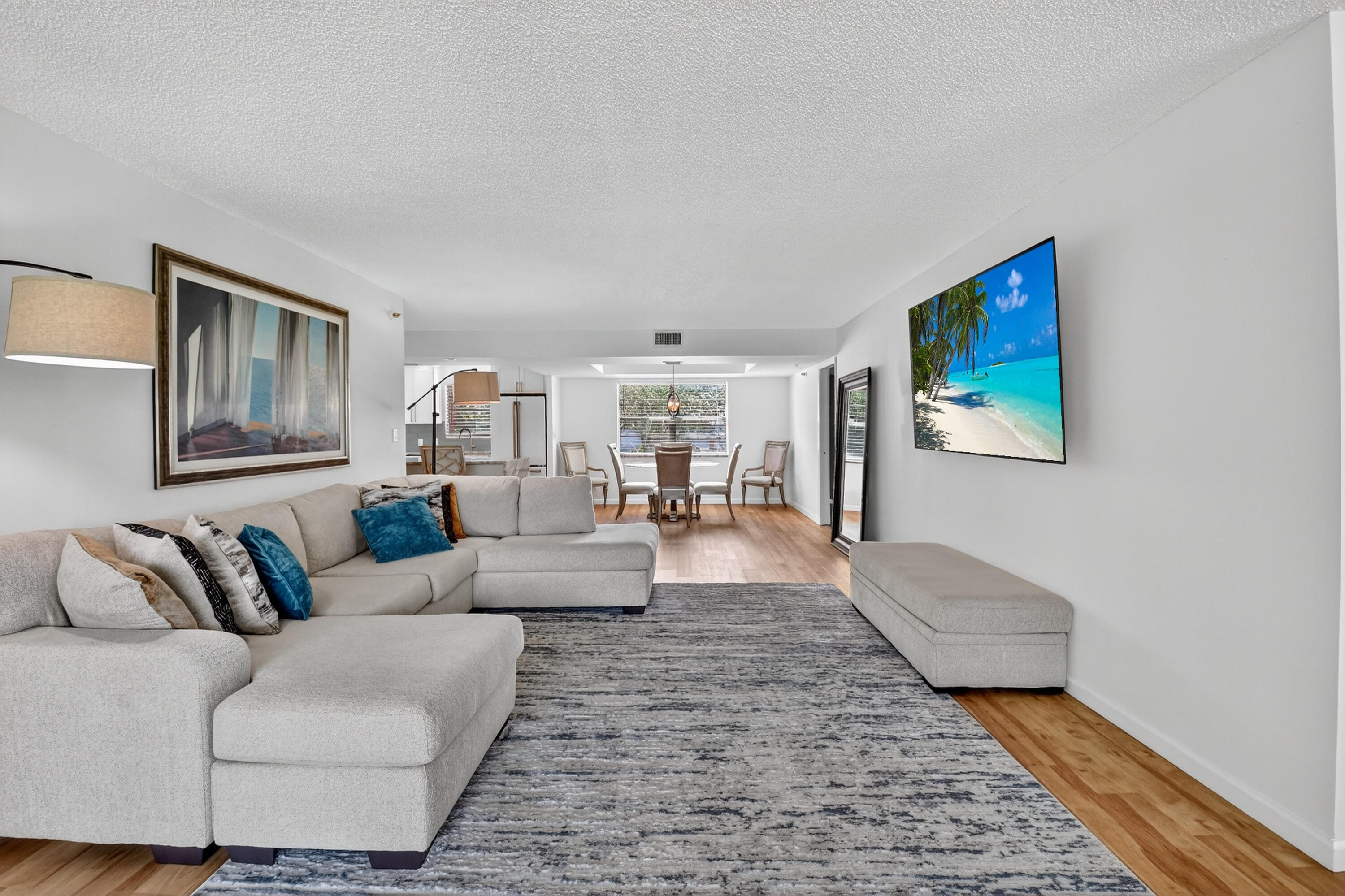 5340 Northwest 2nd Avenue, Unit 220 Boca Raton, FL 33487 - Photo 45 of 46 a living room with furniture and a couch