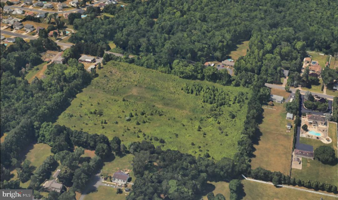63 Kelly Driver Road Clementon, NJ 08021 - Photo 2 of 4 a aerial view of a house with a yard and lake view