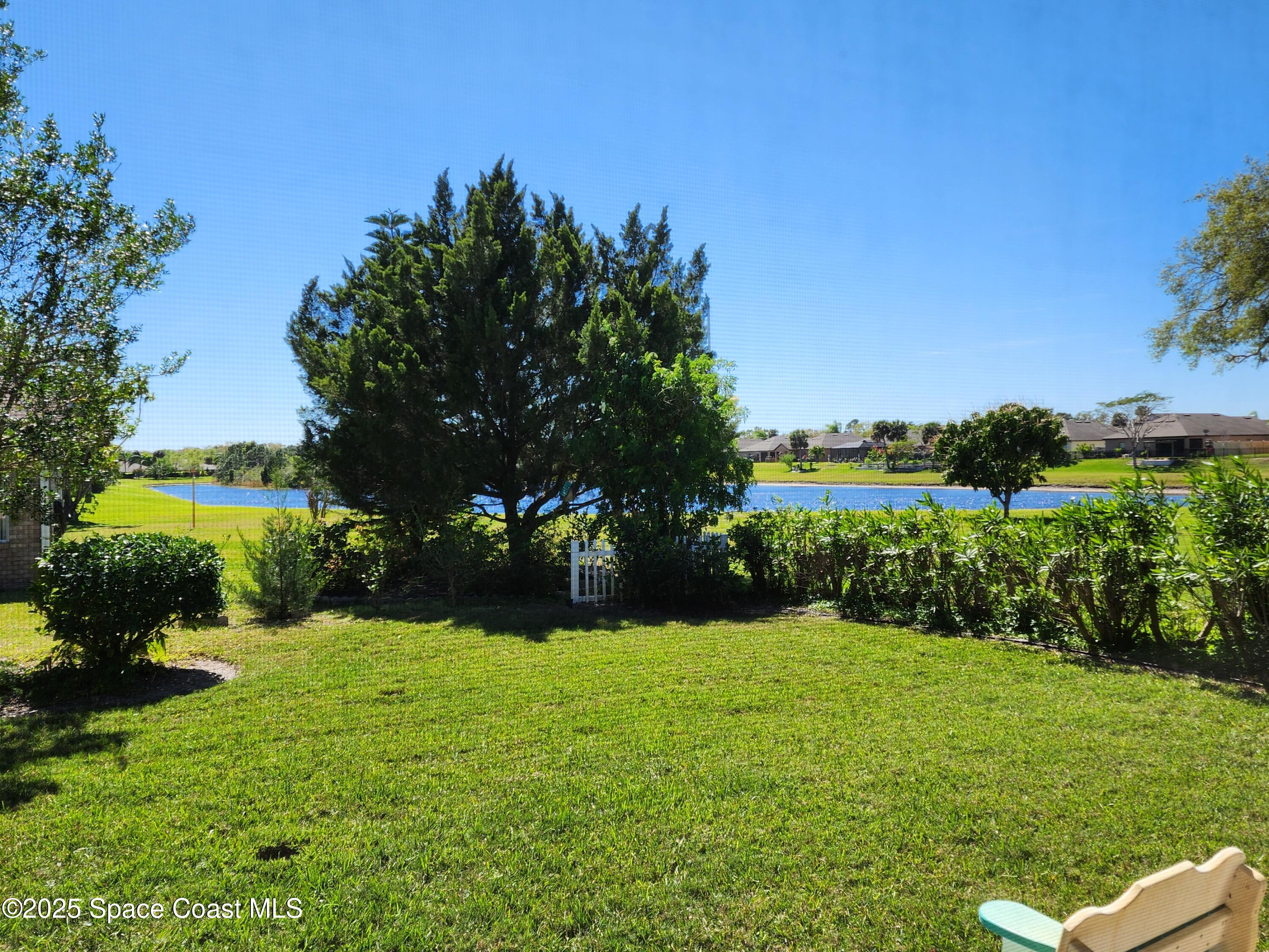 1150 Spring Oak Drive Melbourne, FL 32901 - Photo 31 of 38 Lake front view from patio