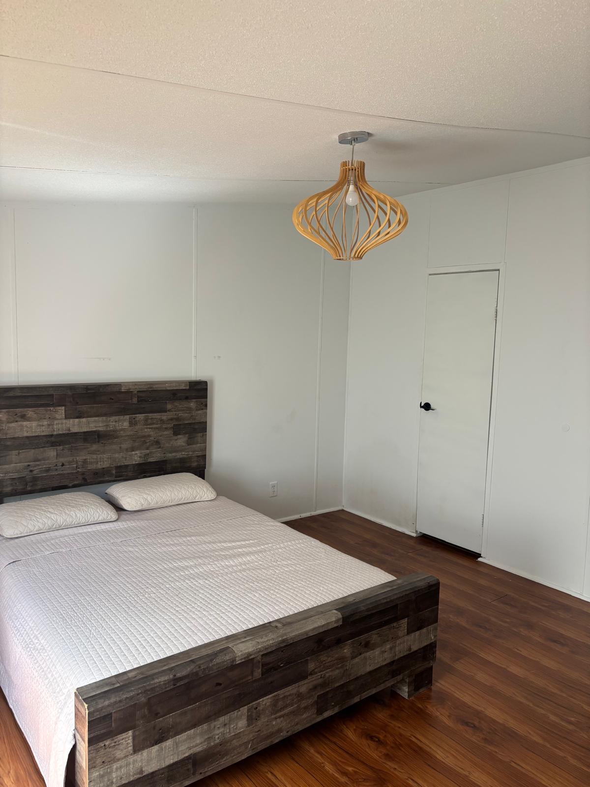 1109 Hurst Creek Road Austin, TX 78734 - Photo 5 of 18 Bedroom featuring dark wood finished floors