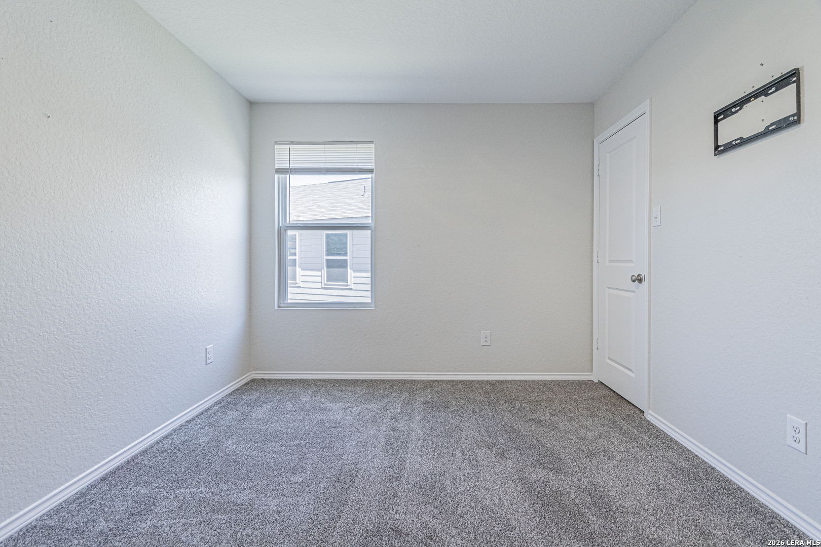 3814 Pickles Way Converse, TX 78109 - Photo 16 of 27 an empty room with a window