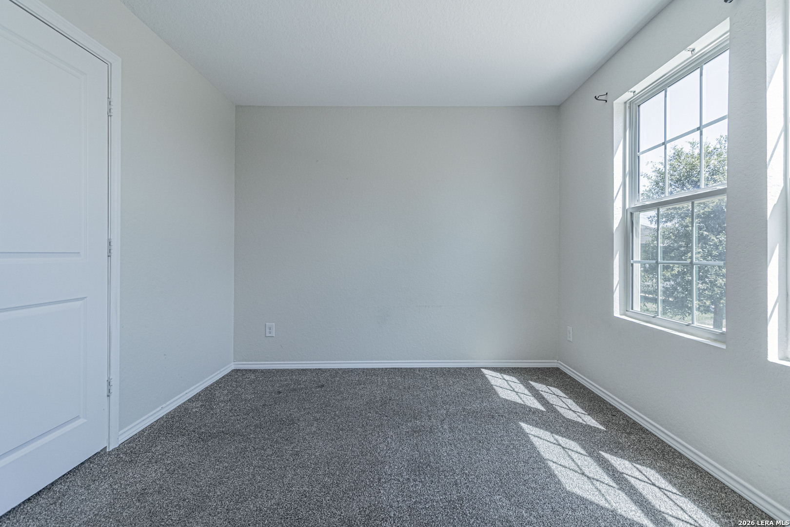 3814 Pickles Way Converse, TX 78109 - Photo 18 of 27 an empty room with a window