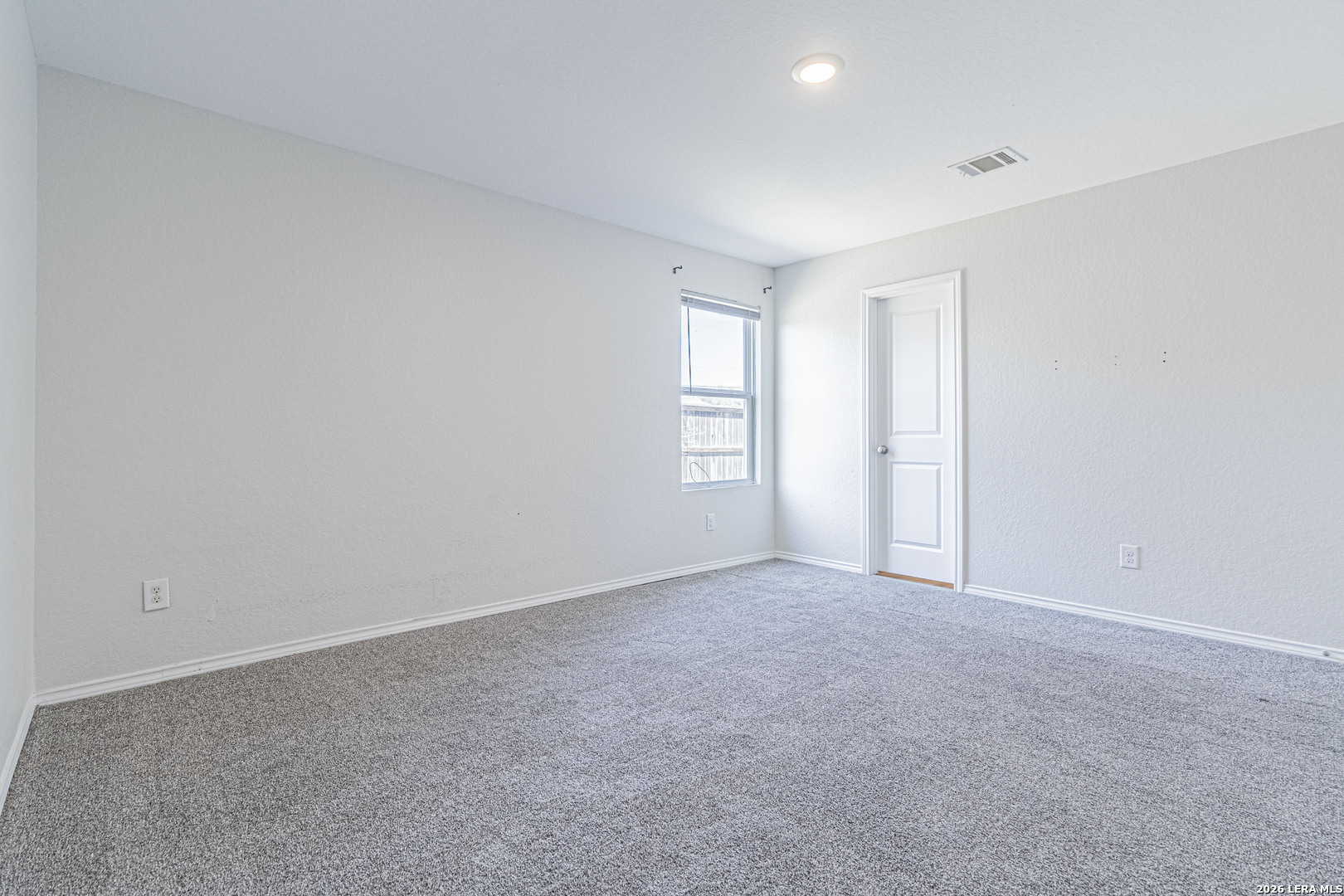 3814 Pickles Way Converse, TX 78109 - Photo 21 of 27 a view of an empty room and a window
