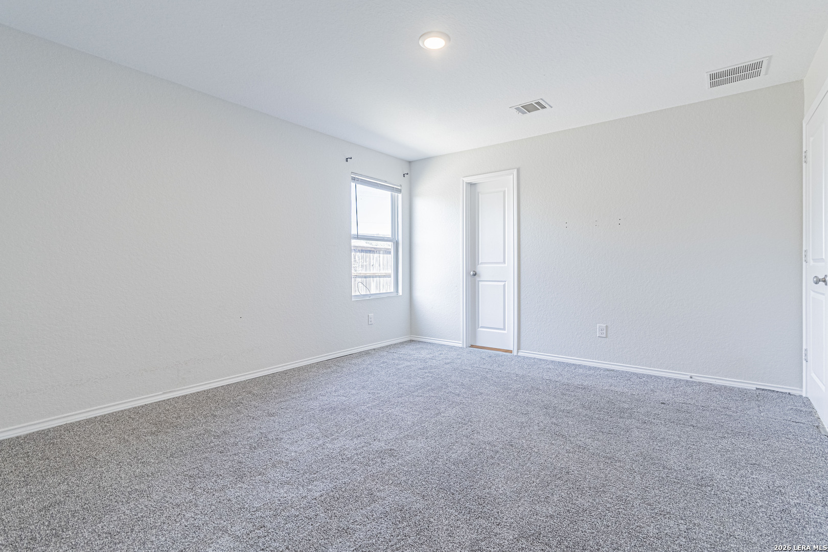 3814 Pickles Way Converse, TX 78109 - Photo 22 of 27 a view of an empty room and a window
